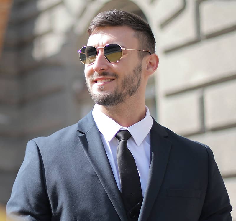 Team Member Man Wearing Sunglasses and a Suit